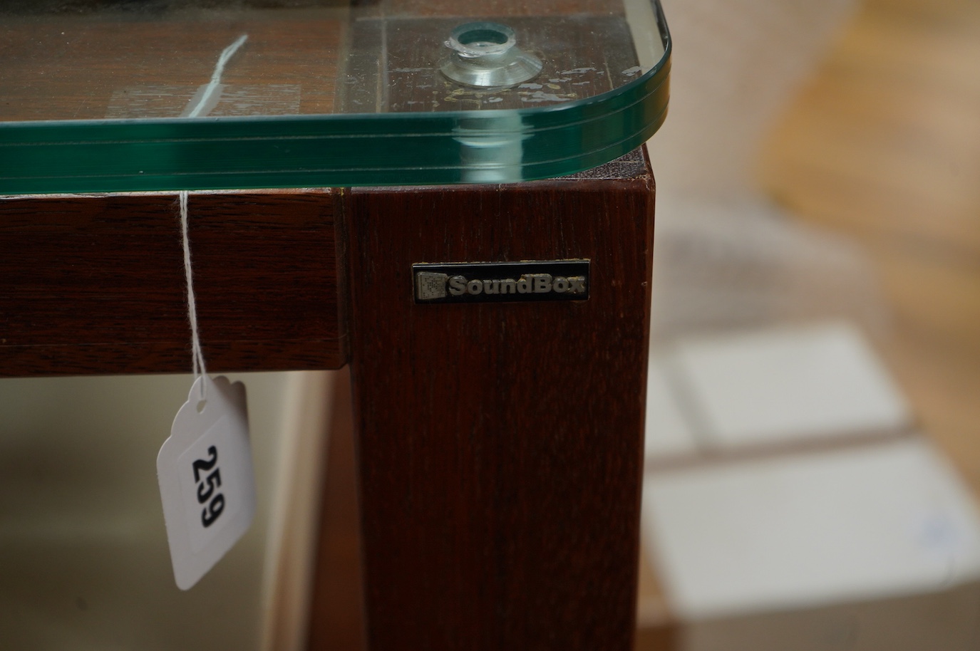 A three section Soundbox HiFi stereo stand in teak, 83cm high, 66cm wide, 46.5cm deep, together with three Silent Running Audio (SRA) Ohio Class high end audio base units in cream cases (designed to reduce vibration) - o